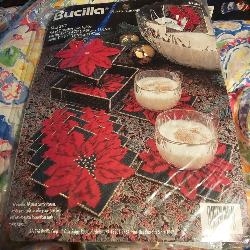 New Bucilla Plastic Canvas Poinsettia‎ Set Of 7 Coasters Plus Holder Kit